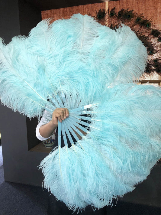 A pair aqua Single layer Ostrich Feather fan 24"x 41" with leather travel Bag.