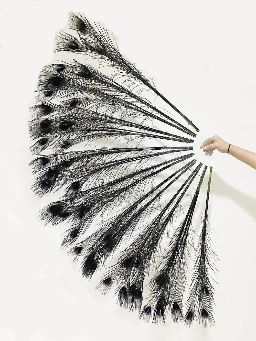 Black peacock feather fan with Travel leather Bag.