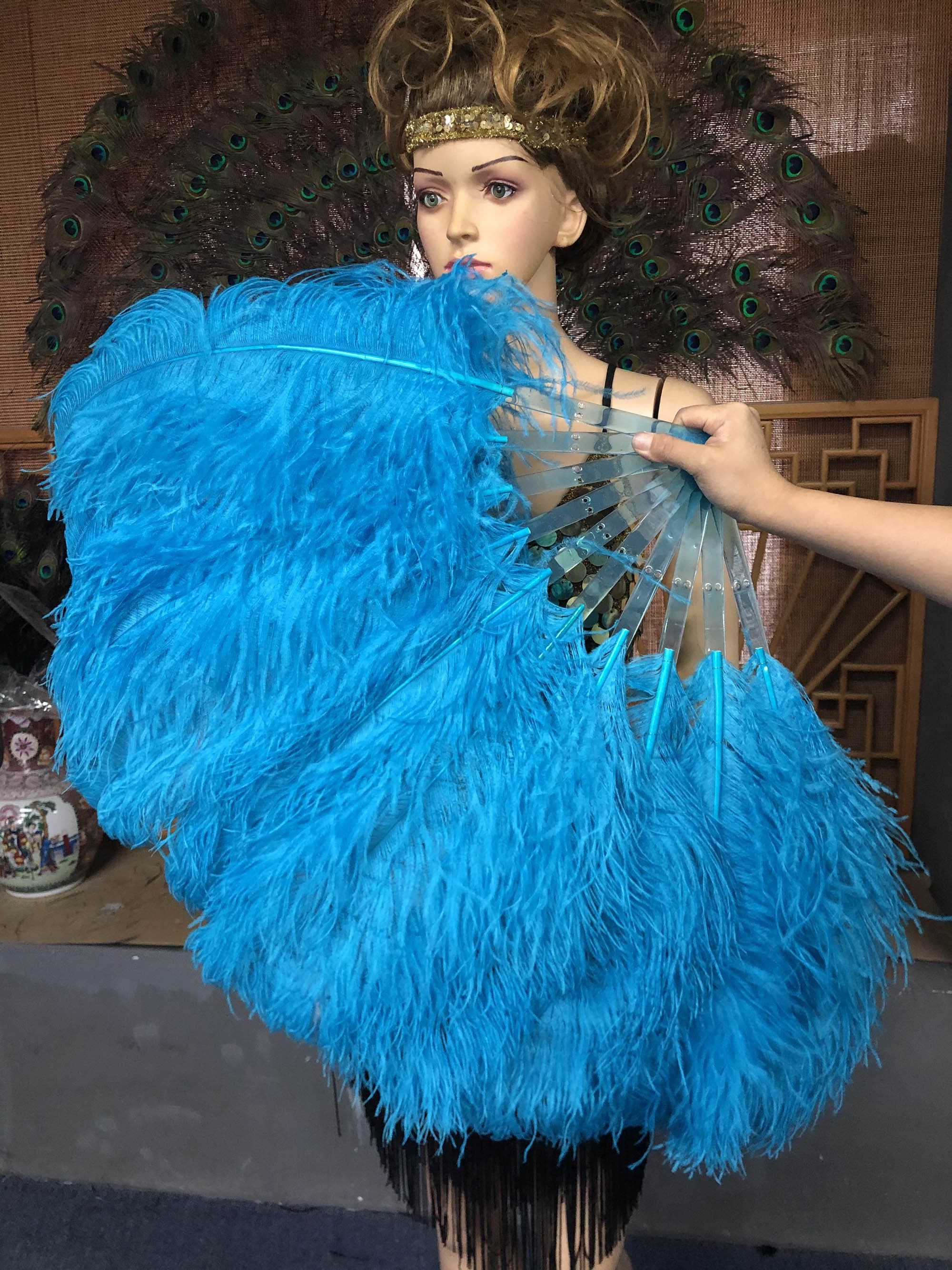 A pair turquoise Single layer Ostrich Feather fan 24"x 41" with leather travel Bag.