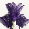 Conjunto de tocado y pieza posterior de cara abierta de plumas de avestruz violeta.